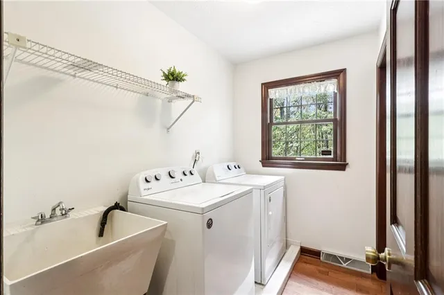 a bathroom with a sink a toilet and a bathtub