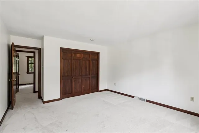 an empty room with closet