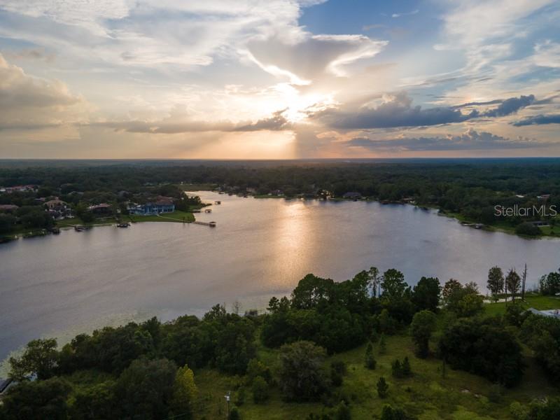 760 Lake Markham Road Sanford, FL 32771 - Photo 4 of 10 a view of a lake from a yard