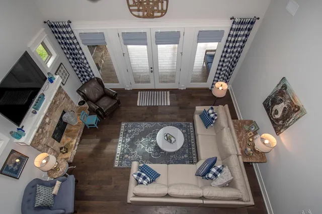 a living room with furniture and a window