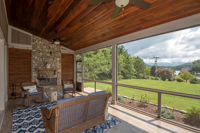 a living room with couch and a table