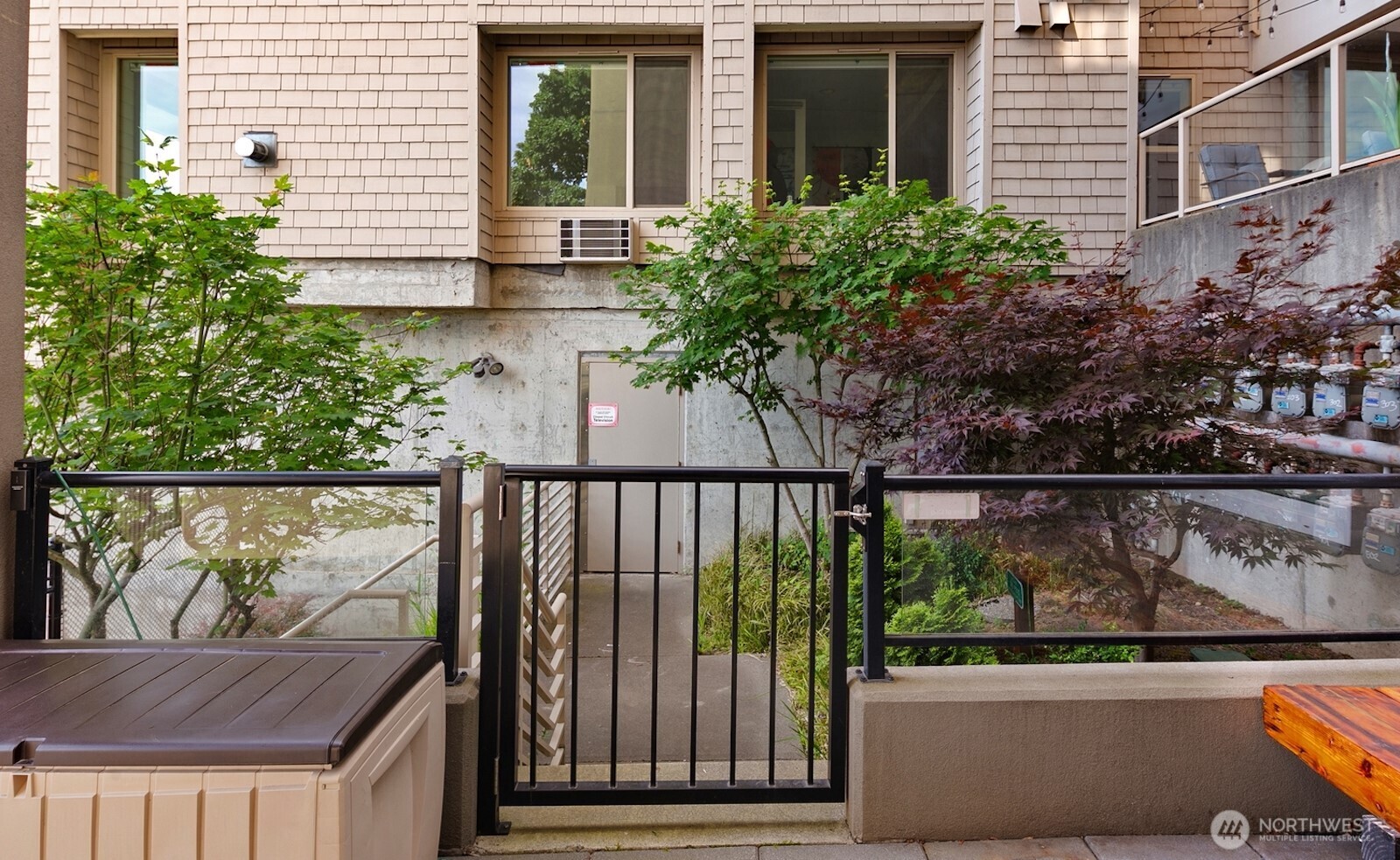505 West Mercer Place, Unit 101 Seattle, WA 98119 - Photo 23 of 24 a view of house with an outdoor space