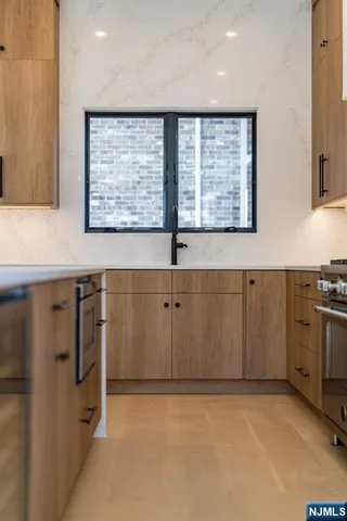 a view of a kitchen with window