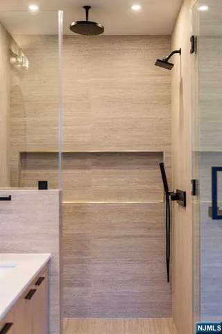 a bathroom with a sink and a shower