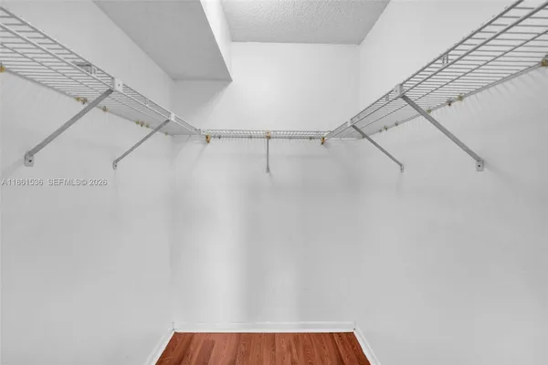 a bathroom with a toilet and shower