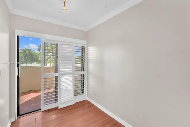 a view of a room with a large window