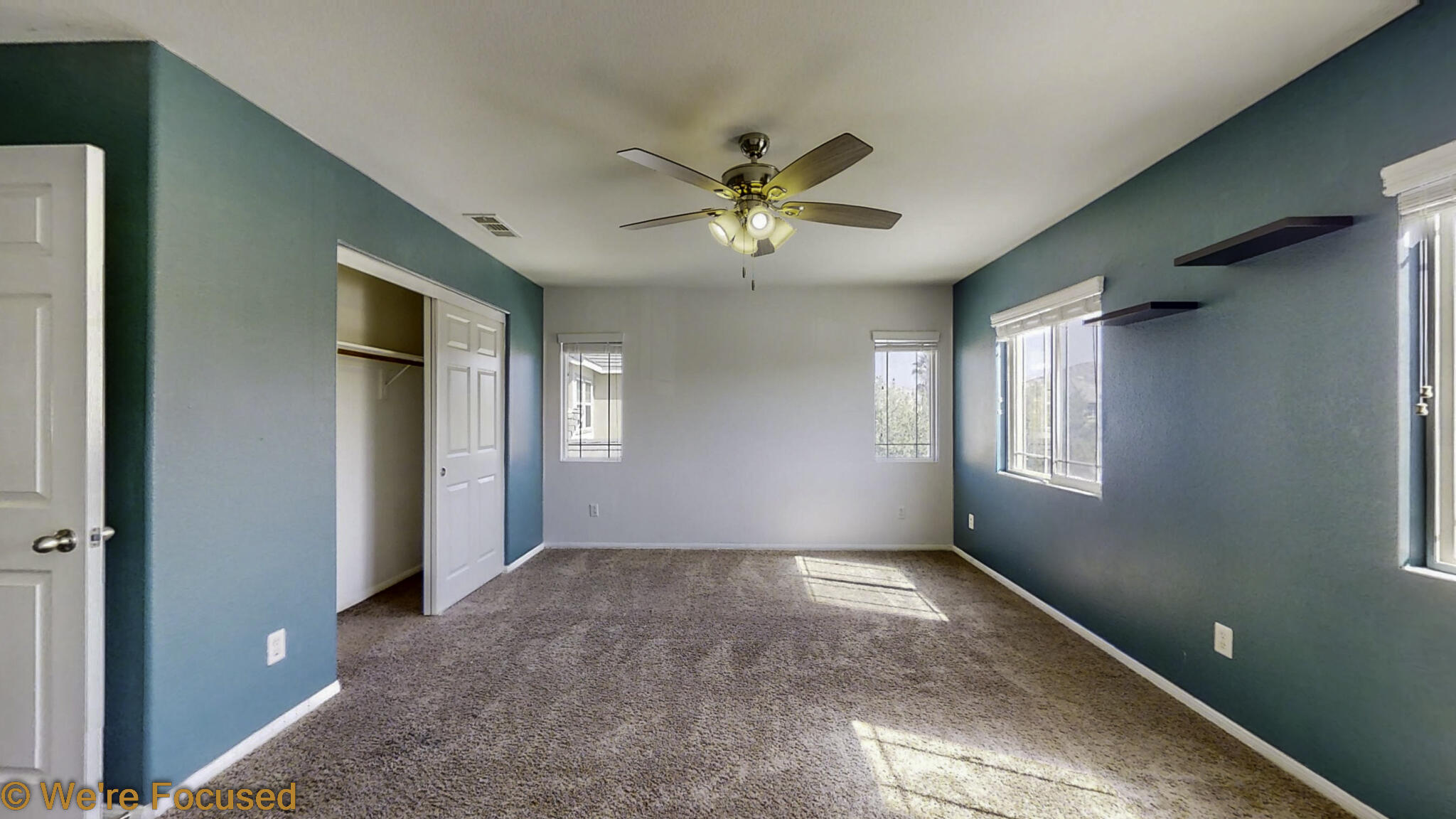 688 Suncup Circle Hemet, CA 92543 - Photo 33 of 65 a view of a livingroom with a ceiling fan and window