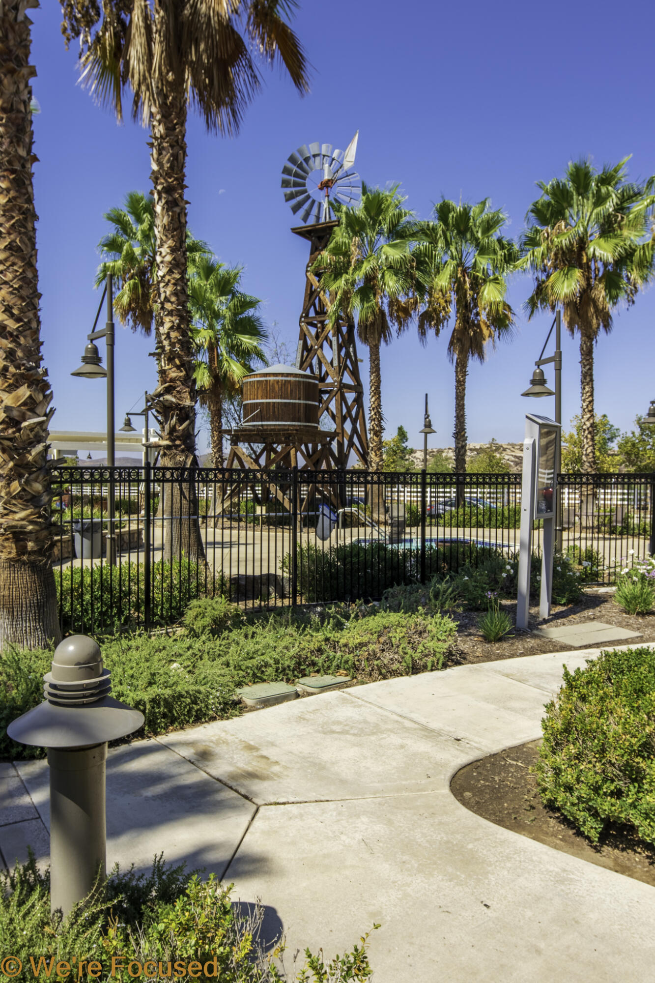 688 Suncup Circle Hemet, CA 92543 - Photo 57 of 65 a front view of a house with a yard and fountain