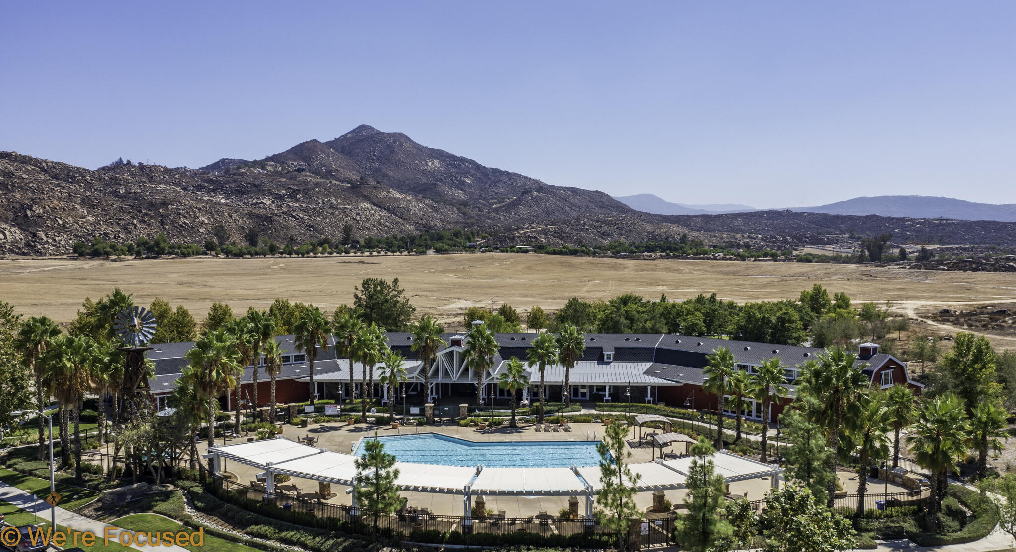 688 Suncup Circle Hemet, CA 92543 - Photo 62 of 65 a view of a lake with a mountain in the back