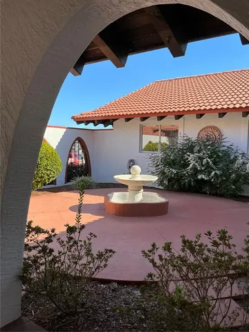 a view of a back yard of the house