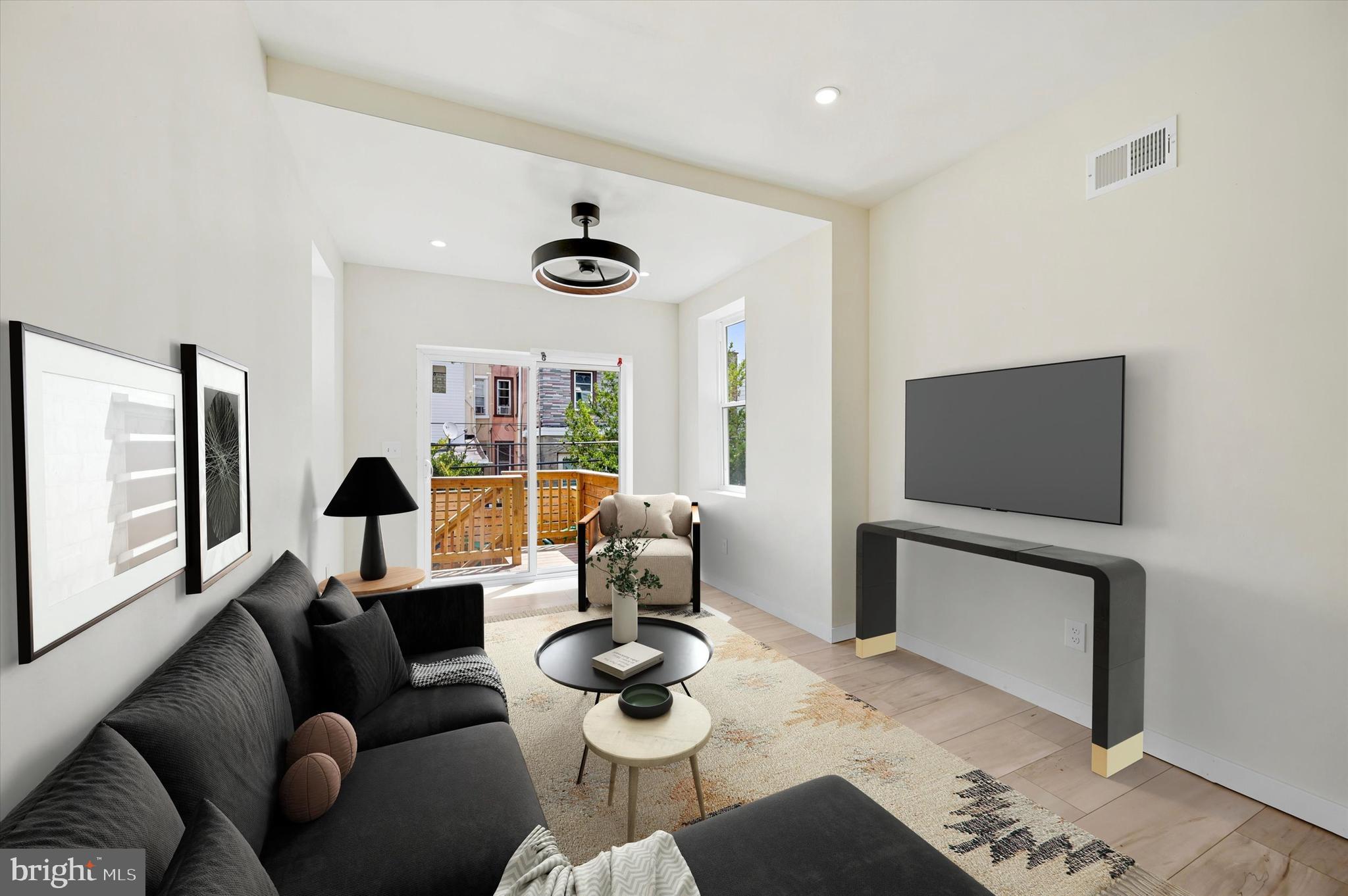 1445 North 60th Street Philadelphia, PA 19151 - Photo 8 of 29 VIRTUALLY STAGED BACK FAMILY ROOM