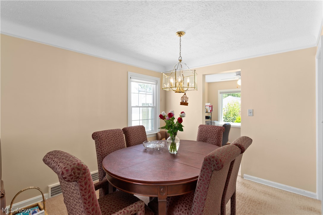 3439 Helen Road Shaker Heights, OH 44122 - Photo 6 of 24 Living room flows into the dining room for easy entertaining