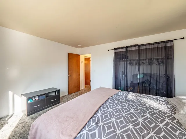 a en suite bathroom with a sink and a mirror