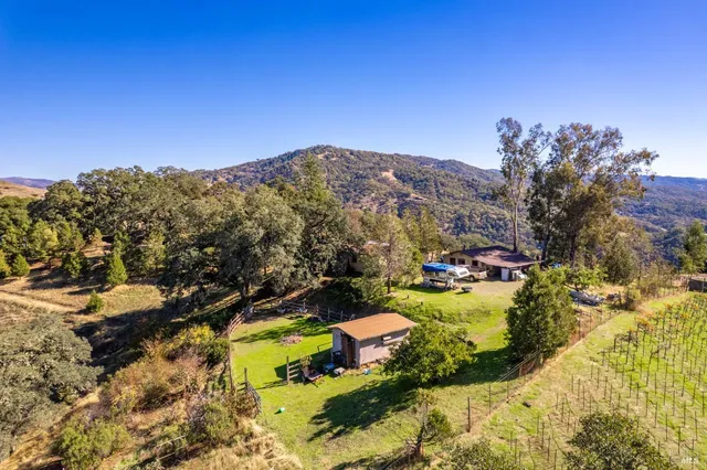 a spacious bedroom with a bed and a window
