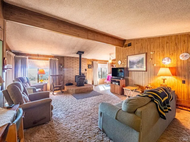 a kitchen with stainless steel appliances a refrigerator and a stove