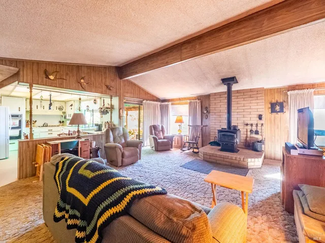 a bathroom with a sink a mirror and a shower