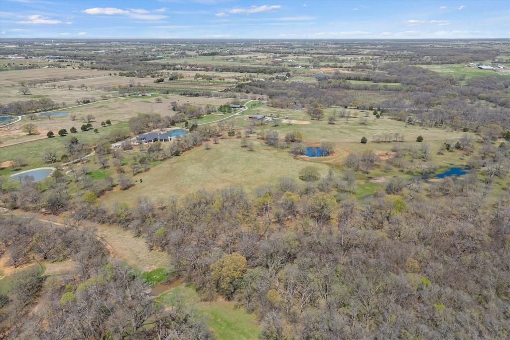 8301 Stephens Ranch Road Pilot Point, TX 76258 - Photo 37 of 40 Wooded for privacy with plenty of pastures and ponds