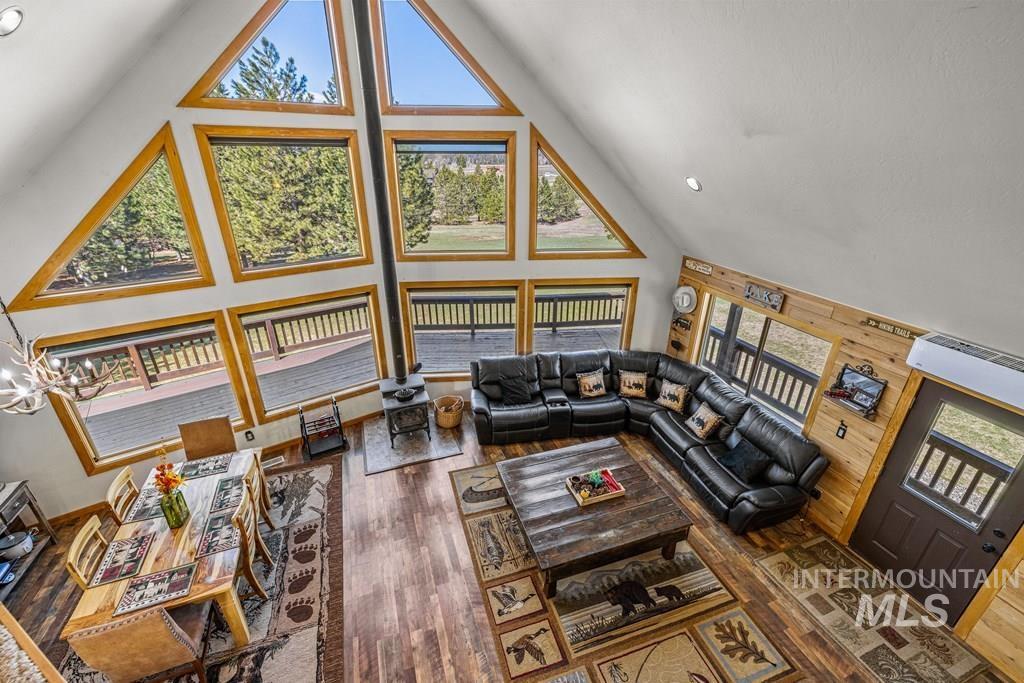 30 Redtail Lane McCall, ID 83638 - Photo 14 of 50 Living area featuring a high ceiling and dark wood-style floors