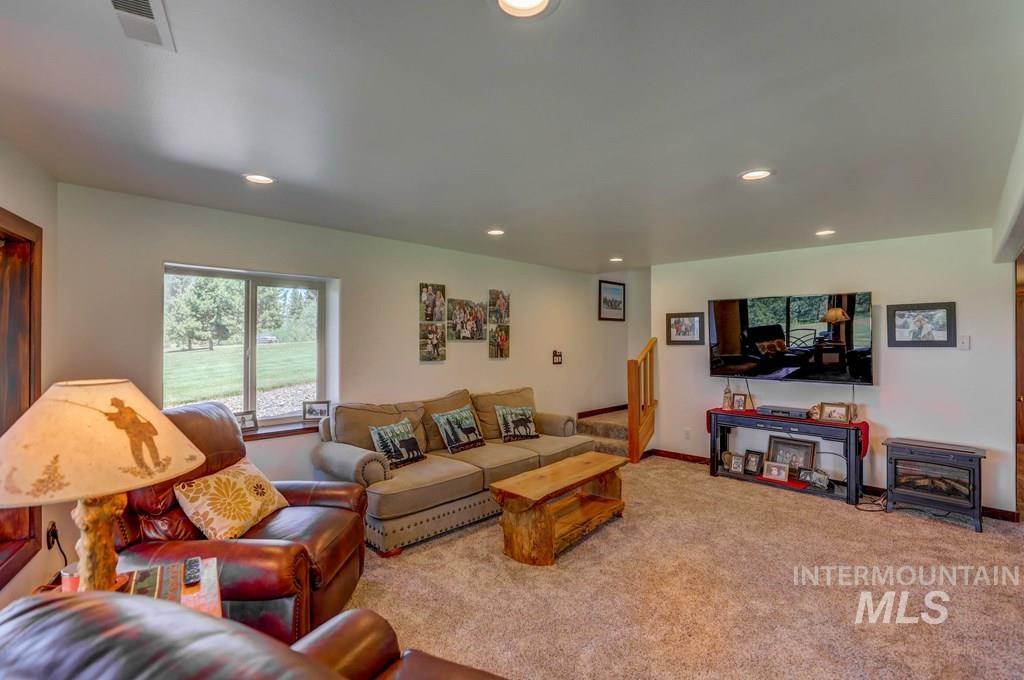 30 Redtail Lane McCall, ID 83638 - Photo 26 of 50 Living room with carpet flooring and recessed lighting