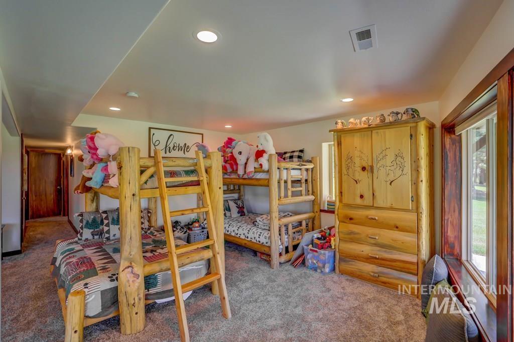 30 Redtail Lane McCall, ID 83638 - Photo 34 of 50 Bedroom featuring carpet flooring and recessed lighting