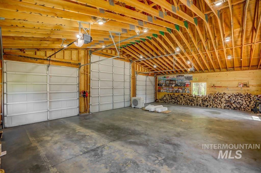 30 Redtail Lane McCall, ID 83638 - Photo 44 of 50 Garage featuring a garage door opener