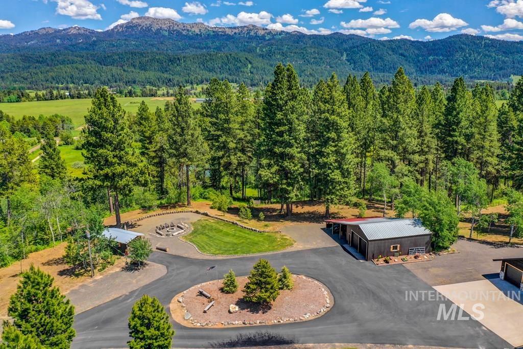 30 Redtail Lane McCall, ID 83638 - Photo 6 of 50 Drone / aerial view of a mountainous background and a heavily wooded area