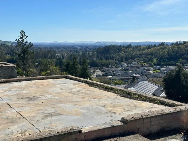 a view of a backyard of a house