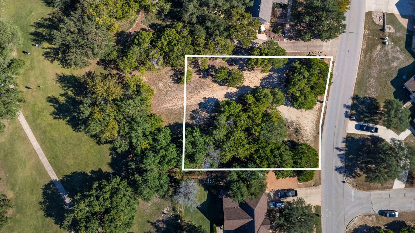 19043 Venture Drive Point Venture, TX 78645 - Photo 3 of 12 Aerial view of property's location with property boundaries highlighted