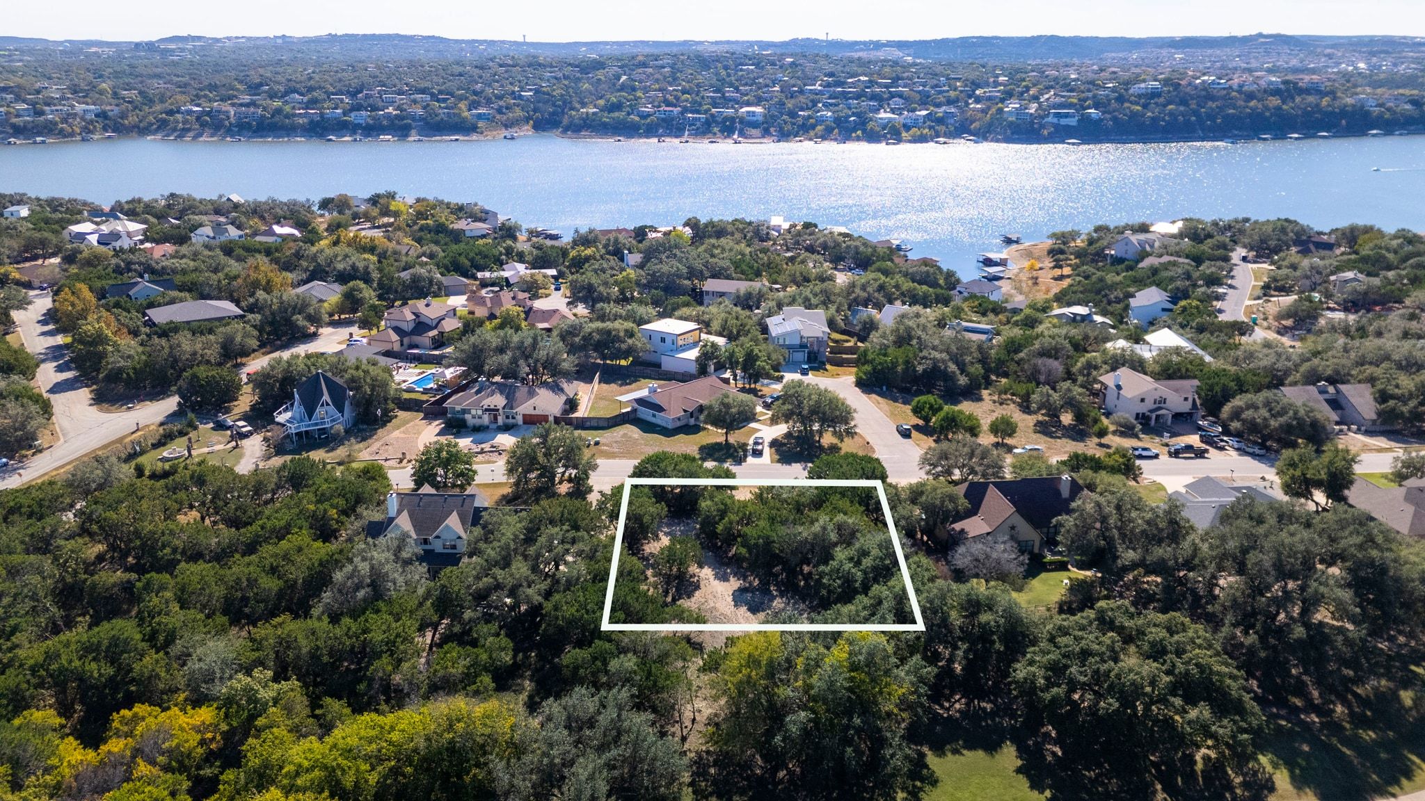 19043 Venture Drive Point Venture, TX 78645 - Photo 8 of 12 an aerial view of lake and residential houses with outdoor space