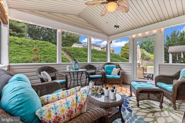 a outdoor living space with furniture and a potted plant