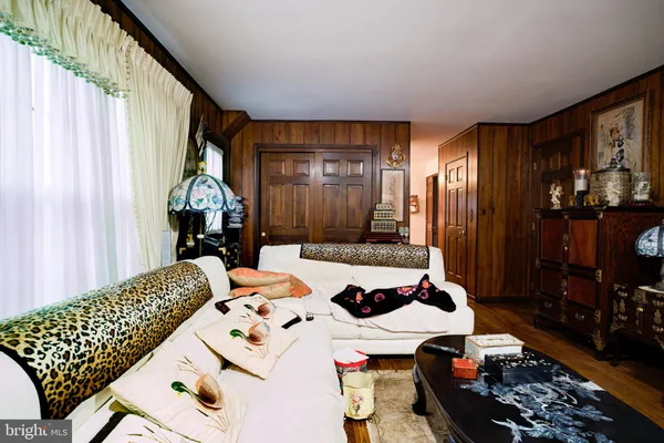 a bed room with a bed and a couch