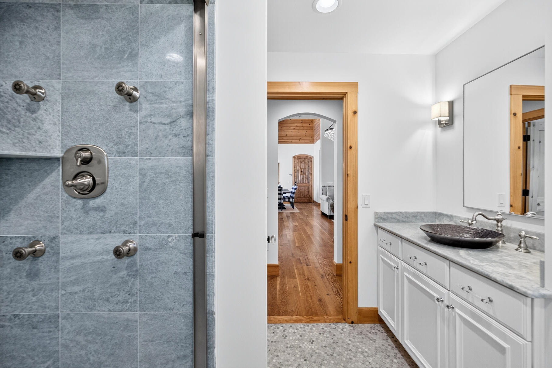 131 Timberlane Drive Mashpee, MA 02649 - Photo 36 of 57 a bathroom with a granite countertop sink a mirror and shower
