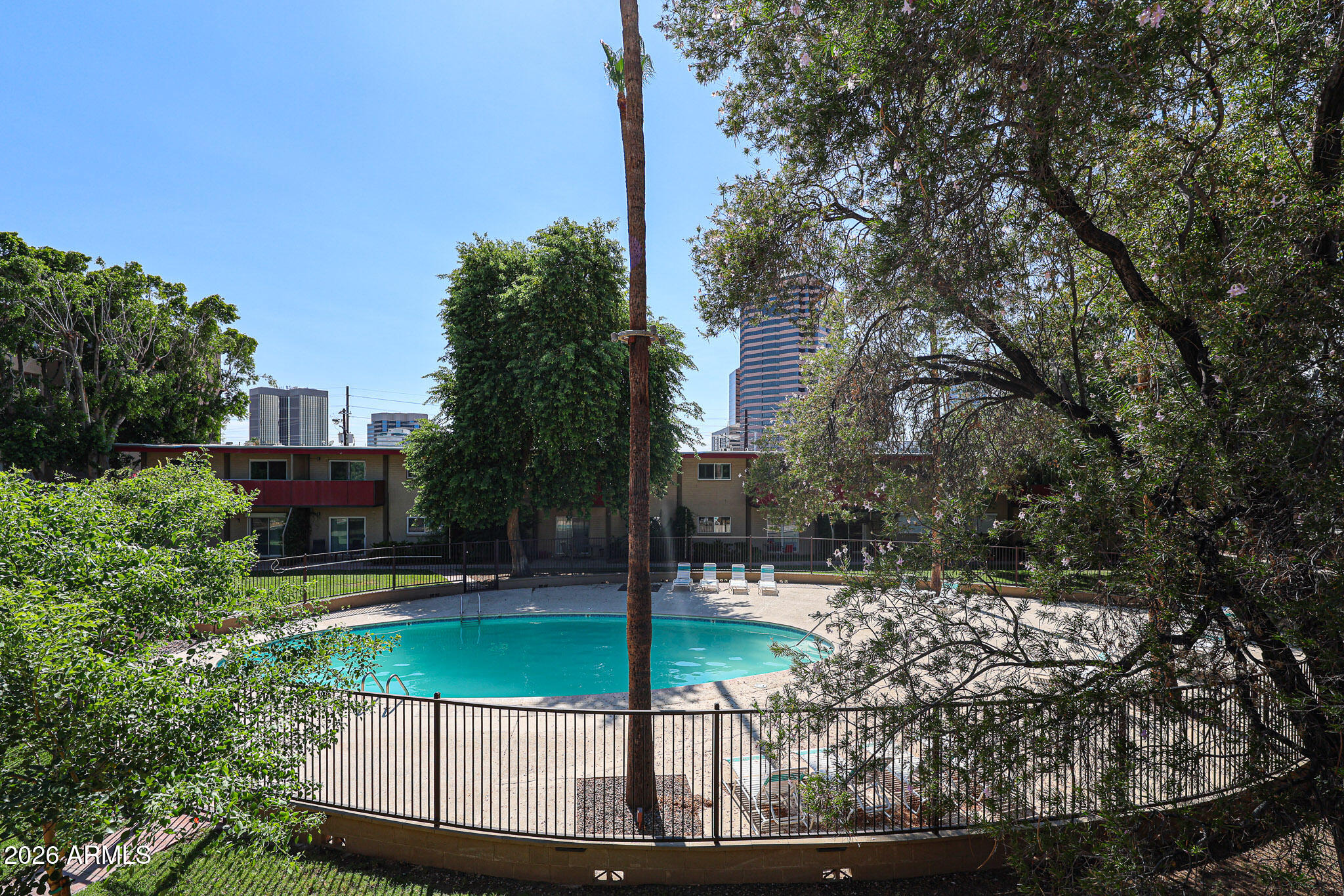 357 East Thomas Road, Unit A208 Phoenix, AZ 85012 - Photo 32 of 36 a view of swimming pool from a balcony