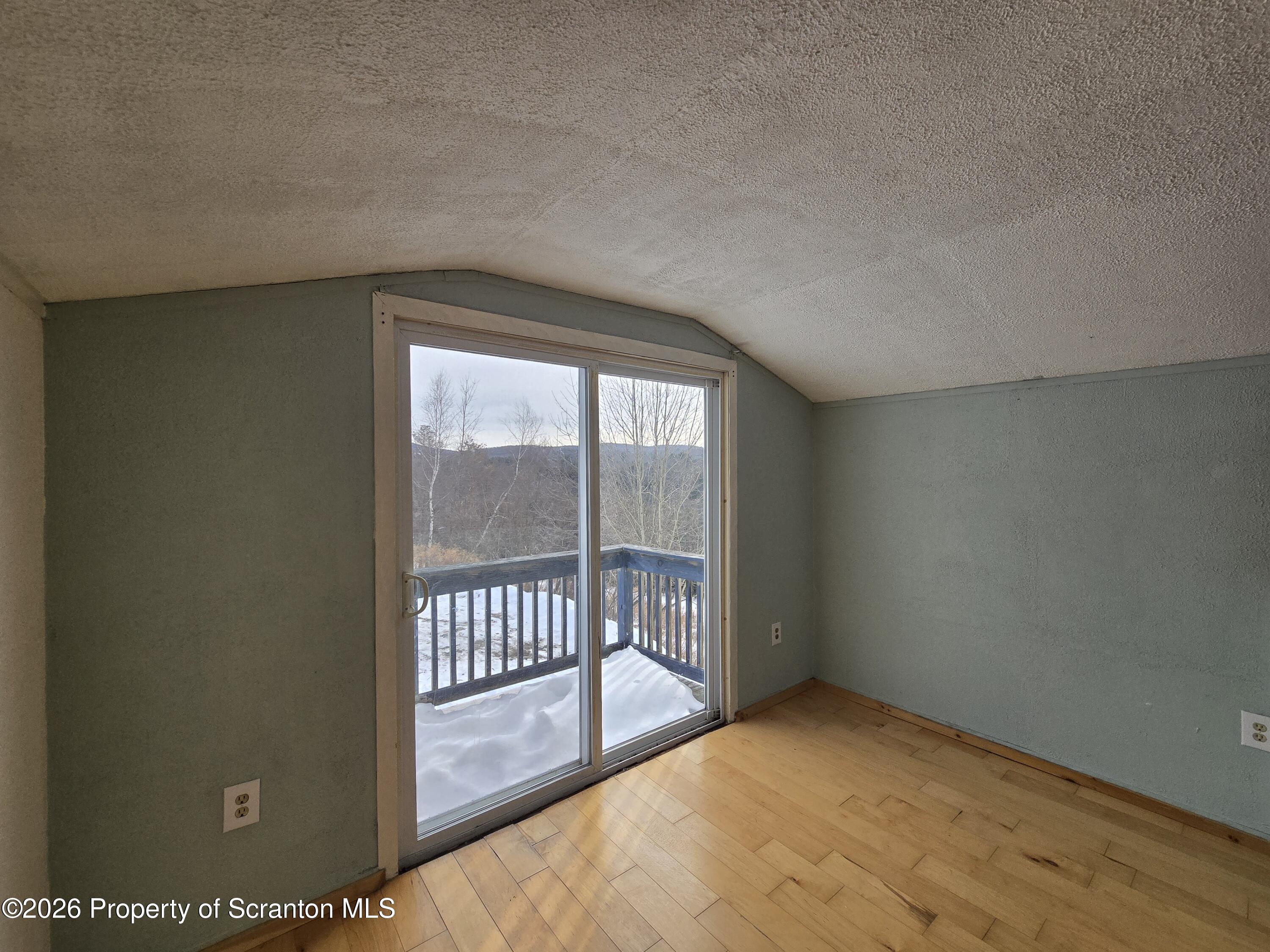 483 Turnpike Street Susquehanna, PA 18847 - Photo 23 of 27 a view of an empty room with glass door