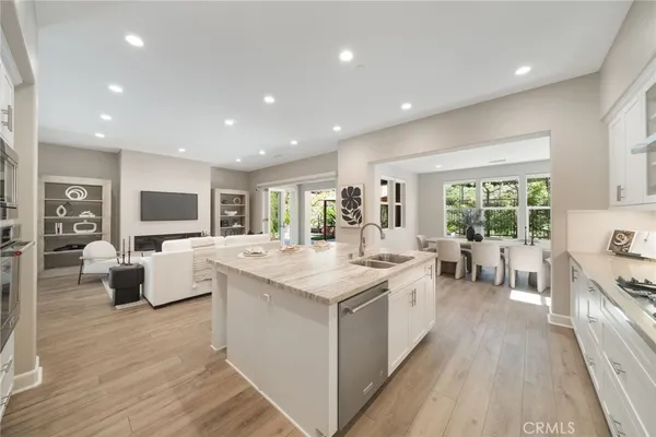 a kitchen with a sink and cabinets