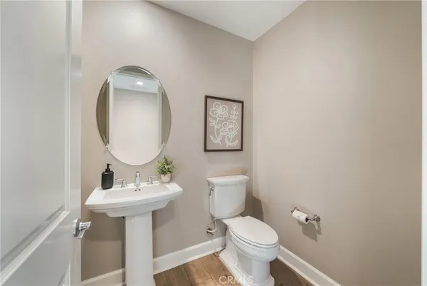 a bathroom with a sink a mirror and window