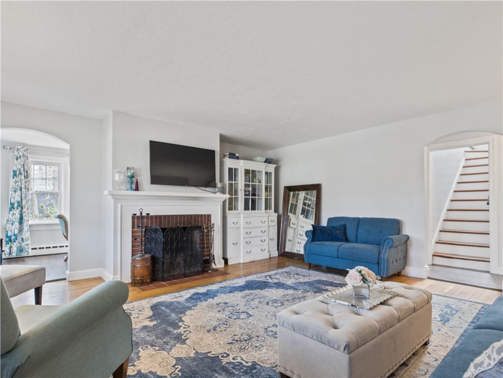 417 Sowams Road Barrington, RI 02806 - Photo 3 of 23 Spacious Living Room w/ Wood Burning Brick Fireplace