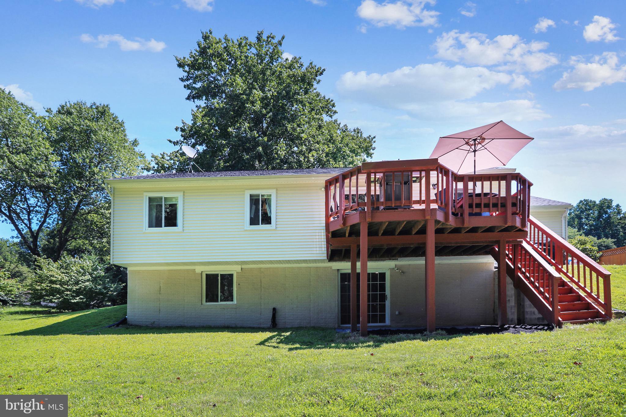 14216 Piccadilly Road Silver Spring, MD 20906 - Photo 40 of 42 Wonderful exterior space with deck and lower patio