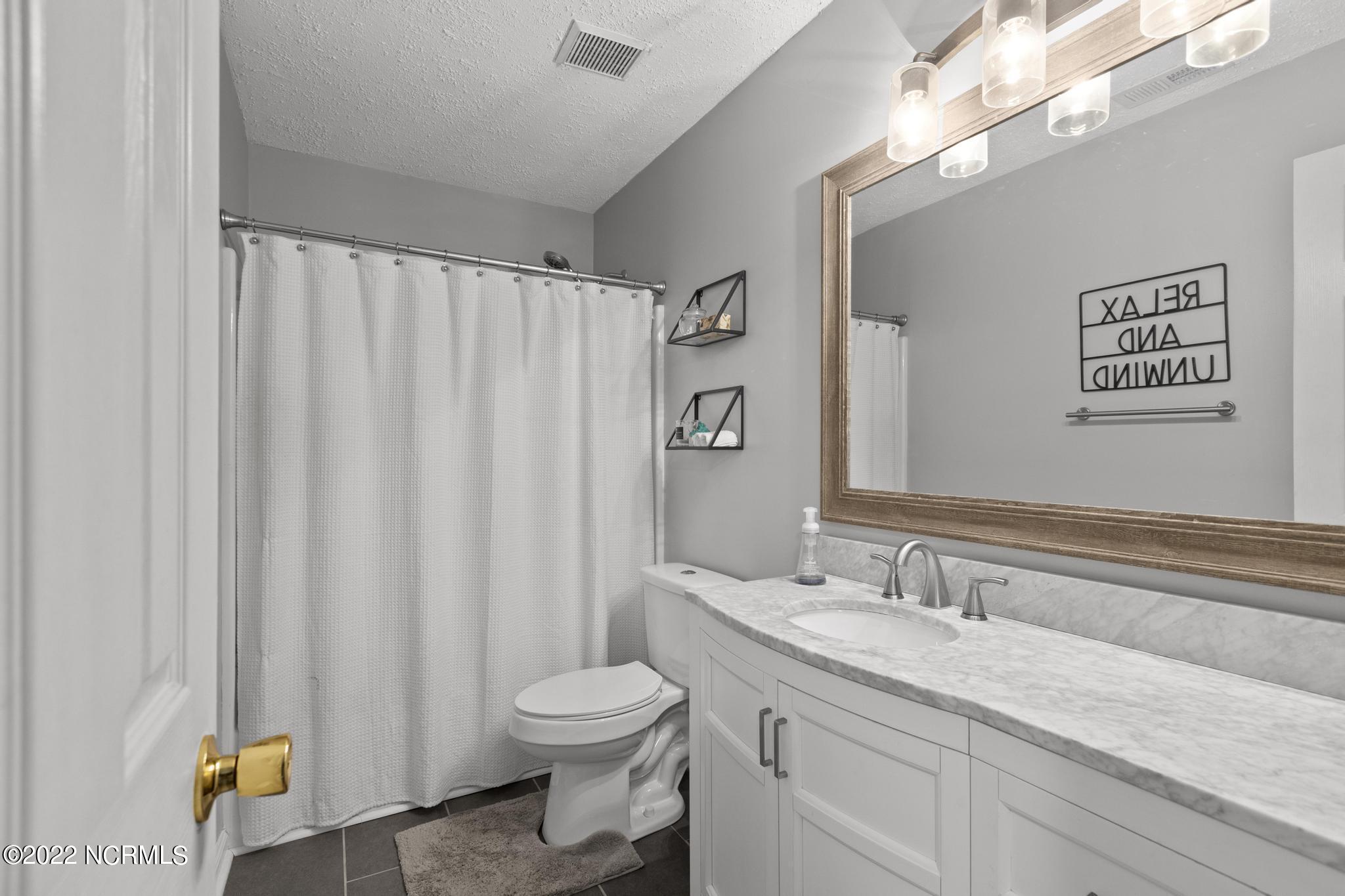 322 Spring Drive Jacksonville, NC 28540 - Photo 16 of 23 Bathroom