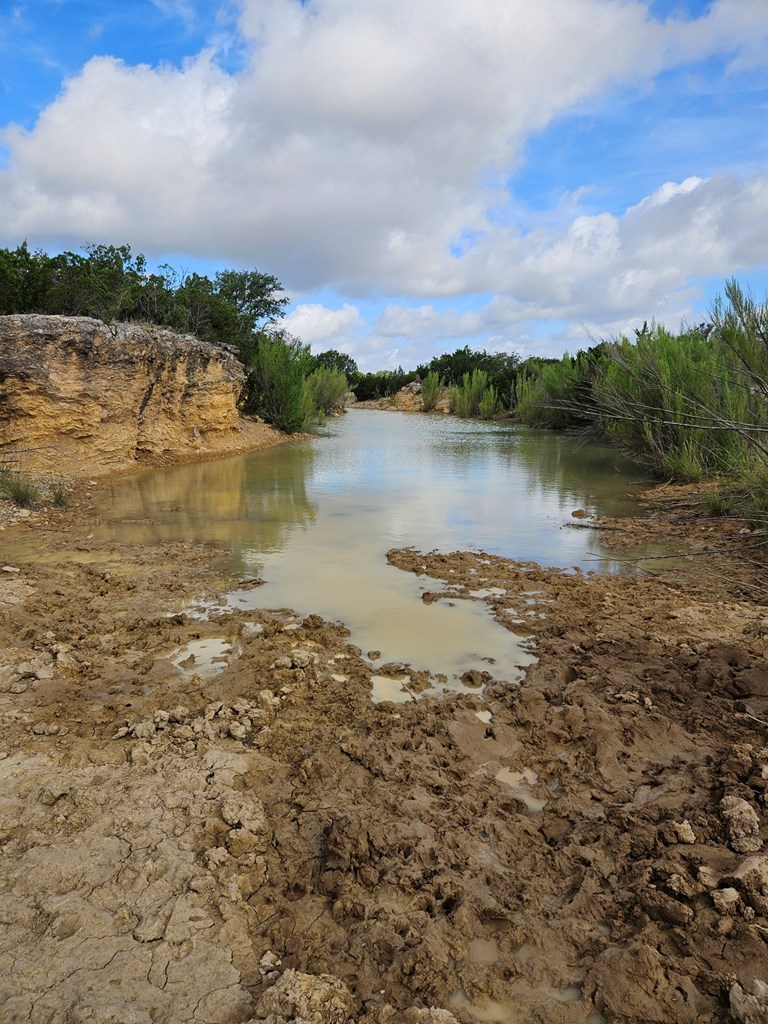 0 J S Murry Ranch Road Del Rio, TX 78840 - Photo 21 of 38 a view of a lake with a city