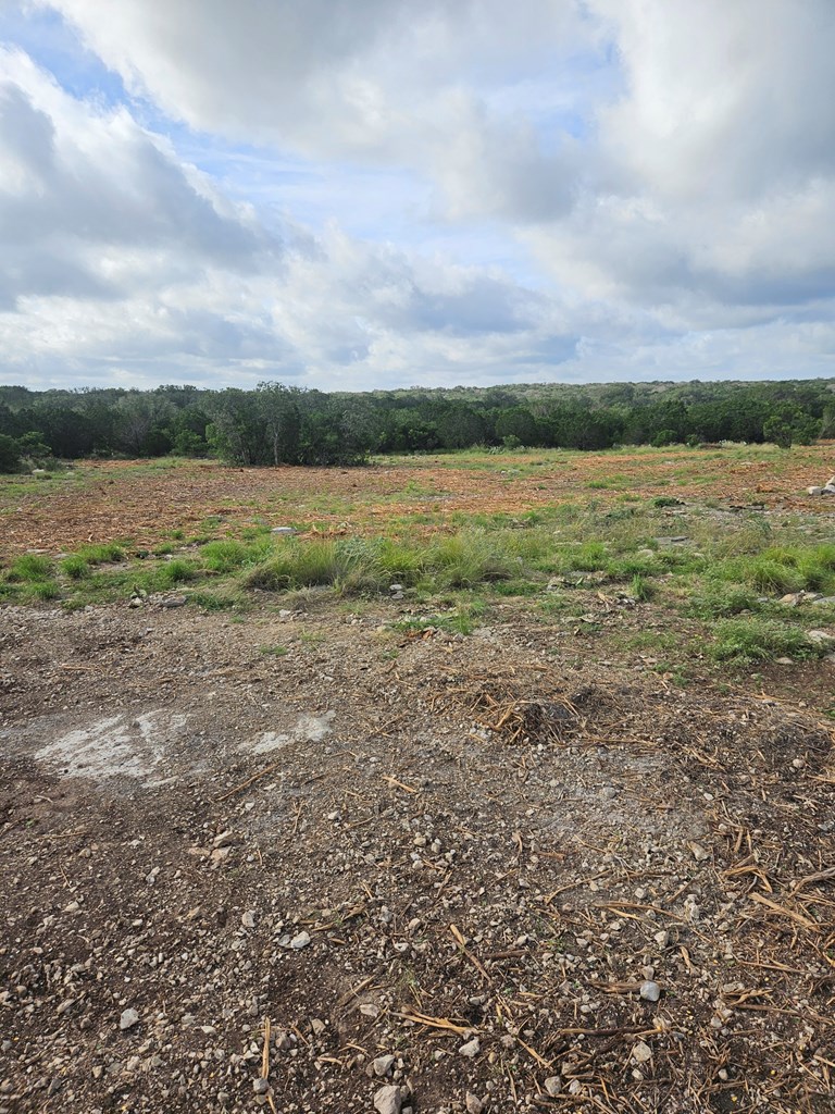 0 J S Murry Ranch Road Del Rio, TX 78840 - Photo 26 of 38 a view of a lake with houses in the back