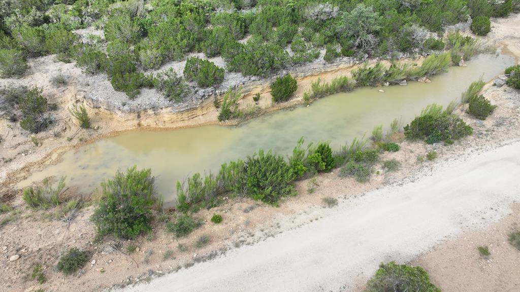 0 J S Murry Ranch Road Del Rio, TX 78840 - Photo 37 of 38 a view of a lake with beach and lake view