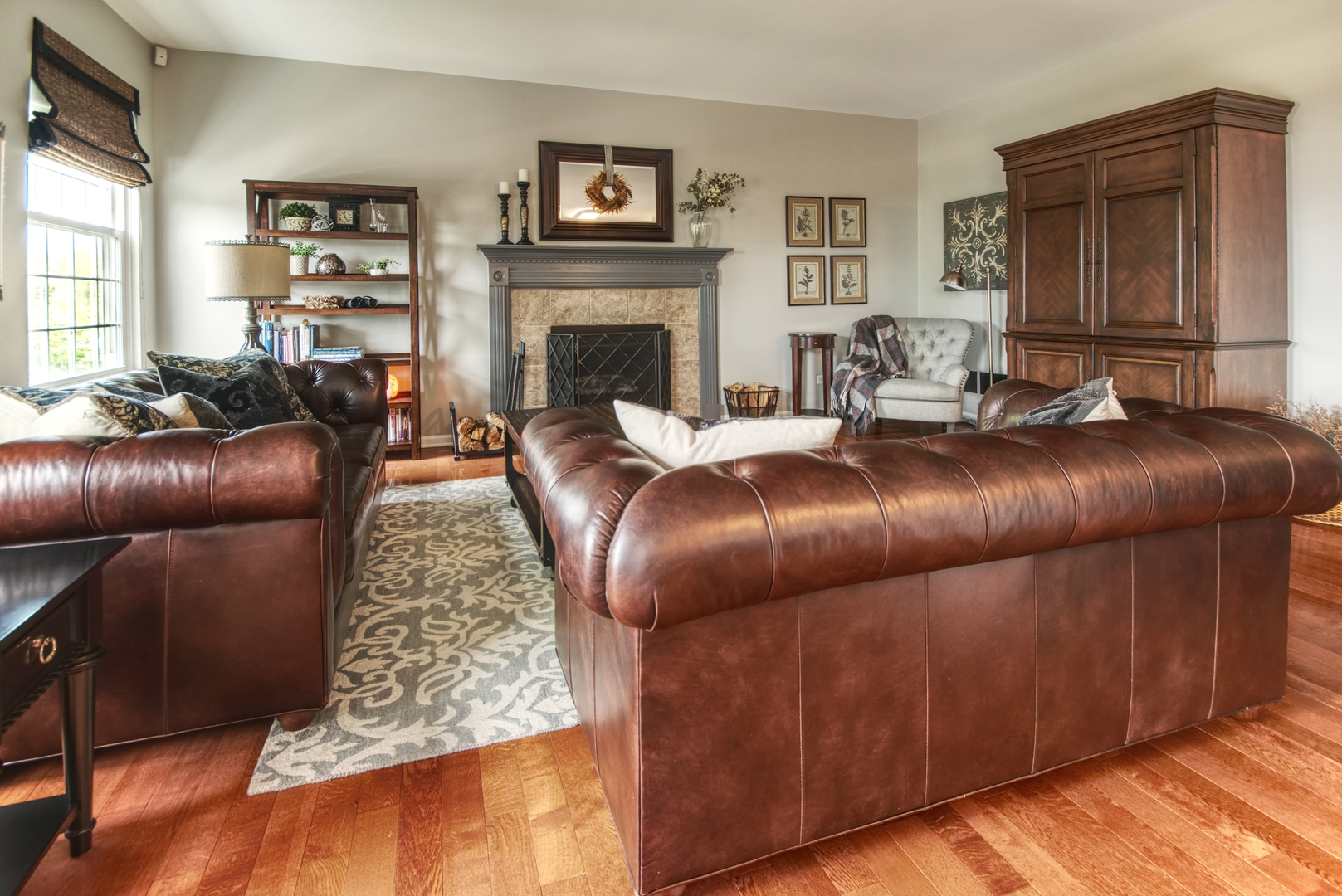 25758 South Basswood Road Channahon, IL 60410 - Photo 12 of 28 a living room with furniture and a fireplace
