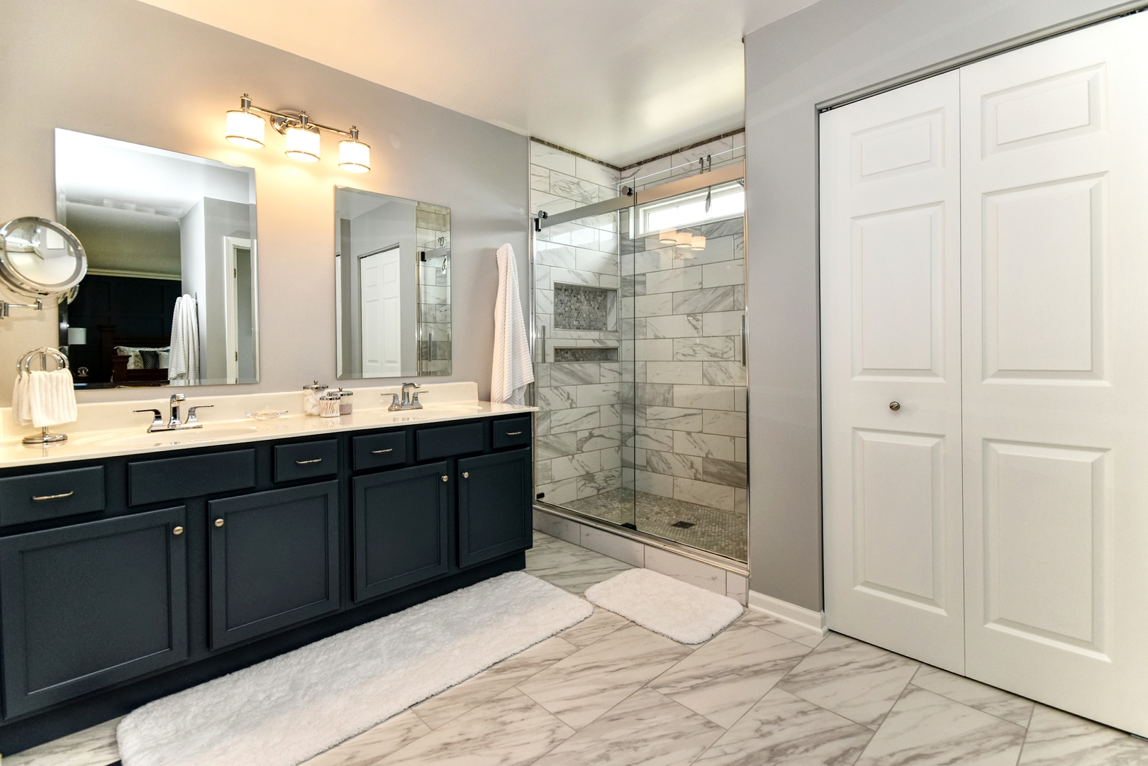 25758 South Basswood Road Channahon, IL 60410 - Photo 20 of 28 a bathroom with a double vanity sink mirror and shower