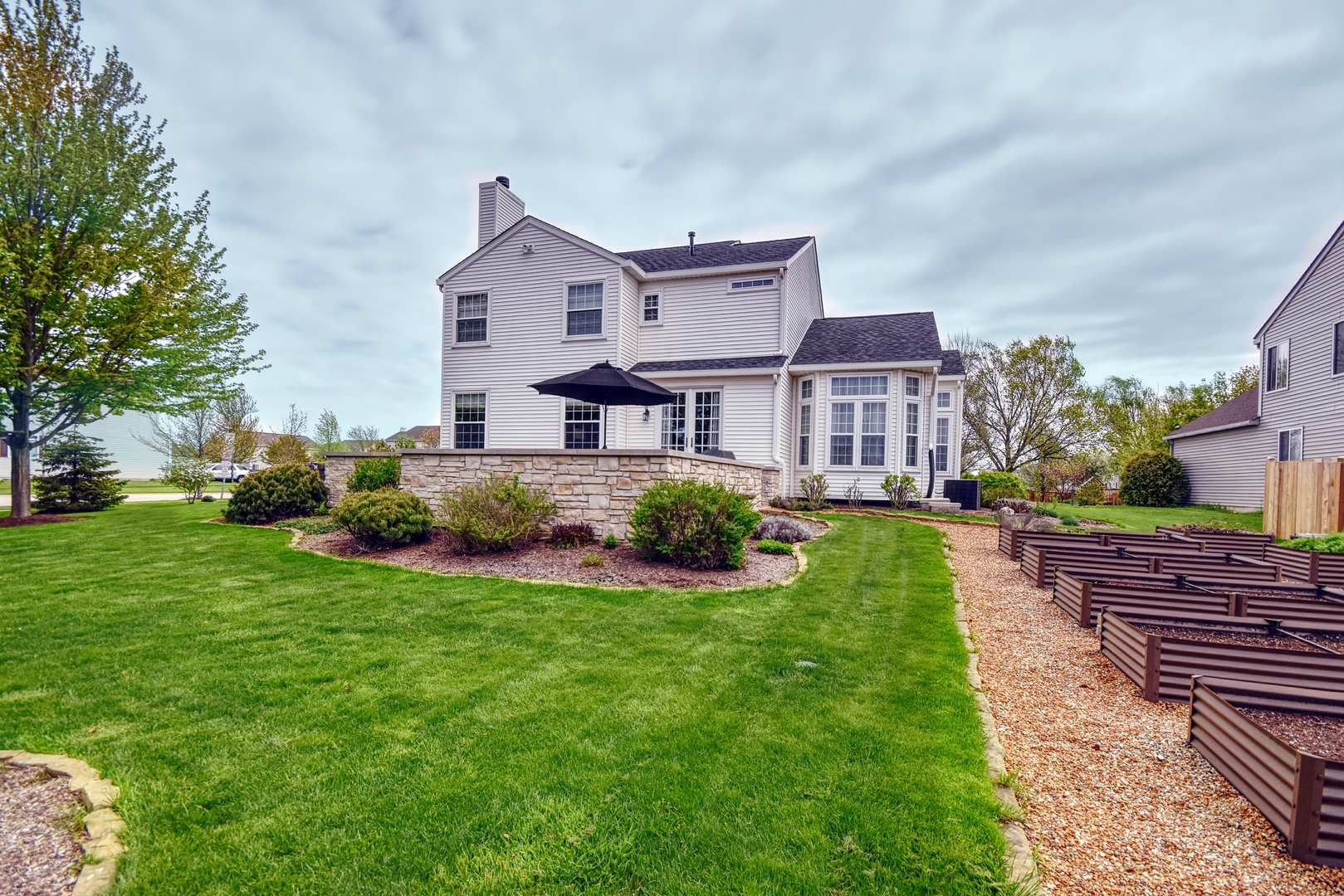 25758 South Basswood Road Channahon, IL 60410 - Photo 28 of 28 a front view of a house with a yard