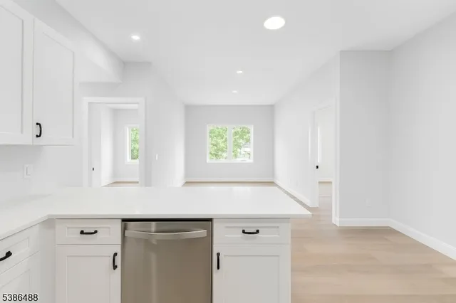 a view white cabinets and window