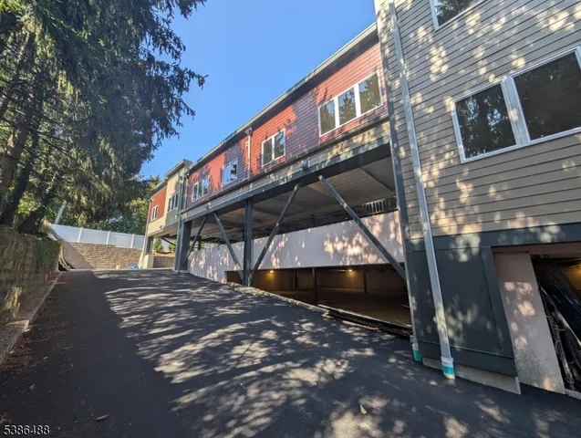 a view of a swimming pool with a yard