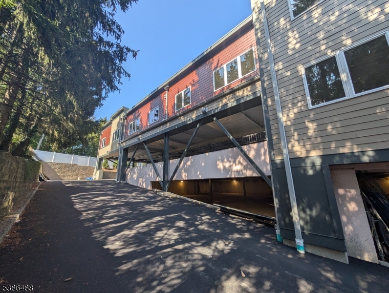391 Springfield Avenue, Unit 3H Berkeley Heights, NJ 07922 - Photo 11 of 14 a view of a swimming pool with a yard
