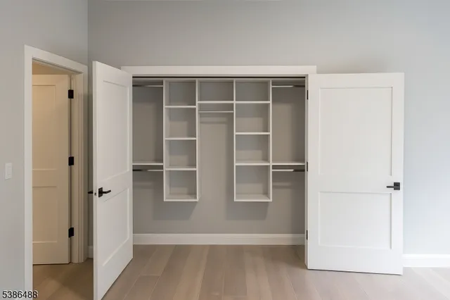 a view of an empty walk in closet