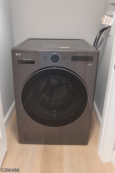 391 Springfield Avenue, Unit 3H Berkeley Heights, NJ 07922 - Photo 13 of 14 a close up view of washer and dryer